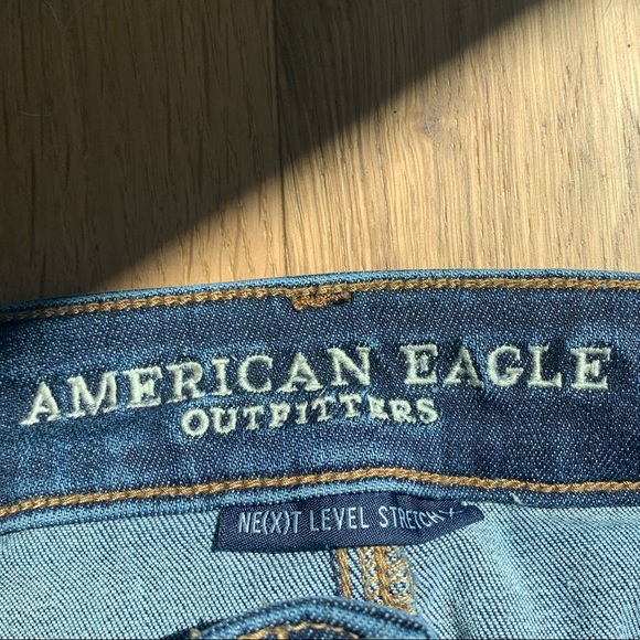 american eagle ne(x)t level stretch dark wash ripped jeans (size 2) - Picture 4 of 5